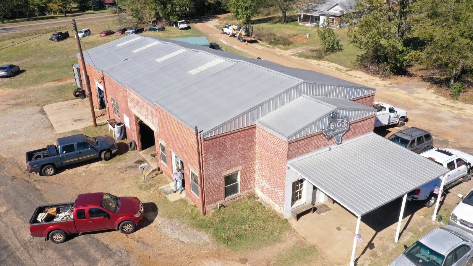 Aerial view of B & G Automotive building and parking area
