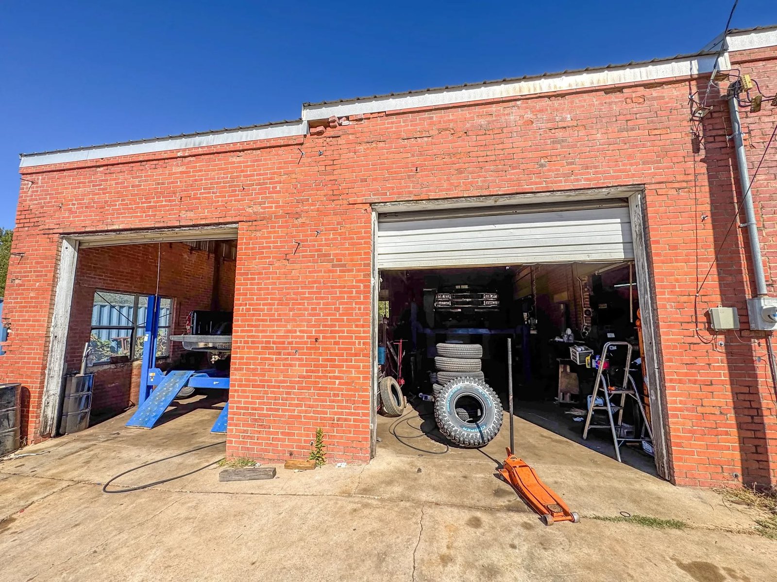B & G Automotive exterior building with garage doors